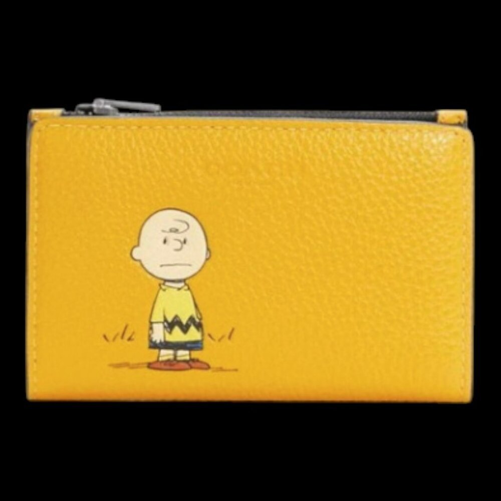 Coach x Peanuts snap wallet featuring Charlie Brown